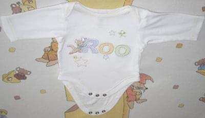 body z długim rękawkiem firmy Disney Baby rozmiar z metki Newborn 56 / 5kg